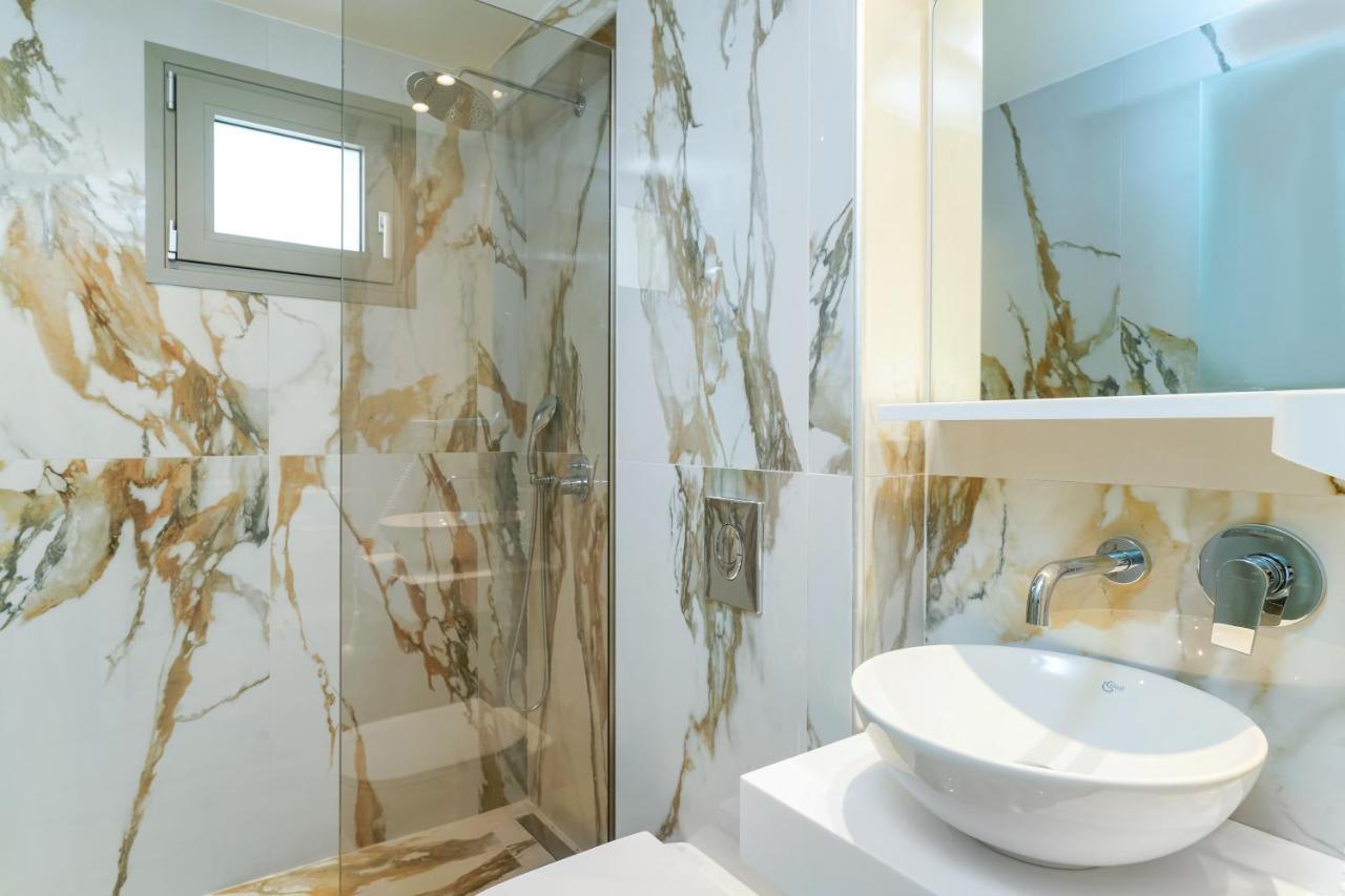 Athina Palace Luxurious Appartments Potos Bagian luar foto